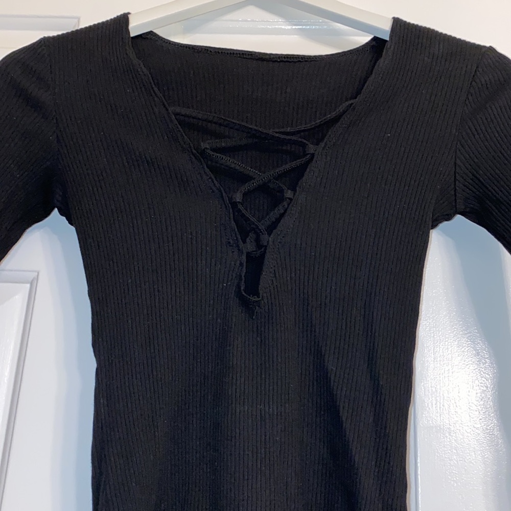 Crisscross black ribbed bodysuit